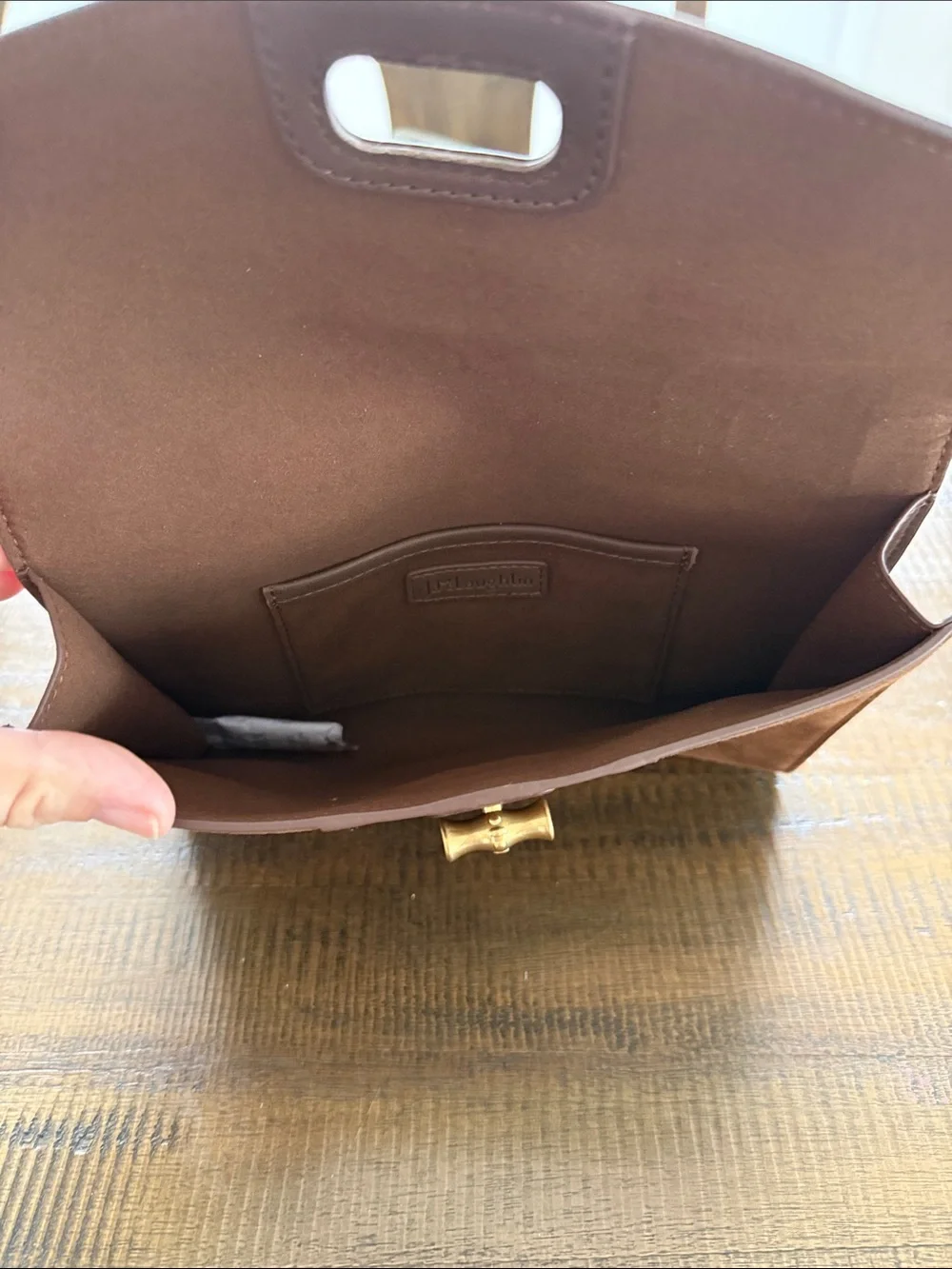 J McLaughlin leather and suede clutch